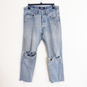 Reformation x Levi’s distressed light blue straight leg denim jeans